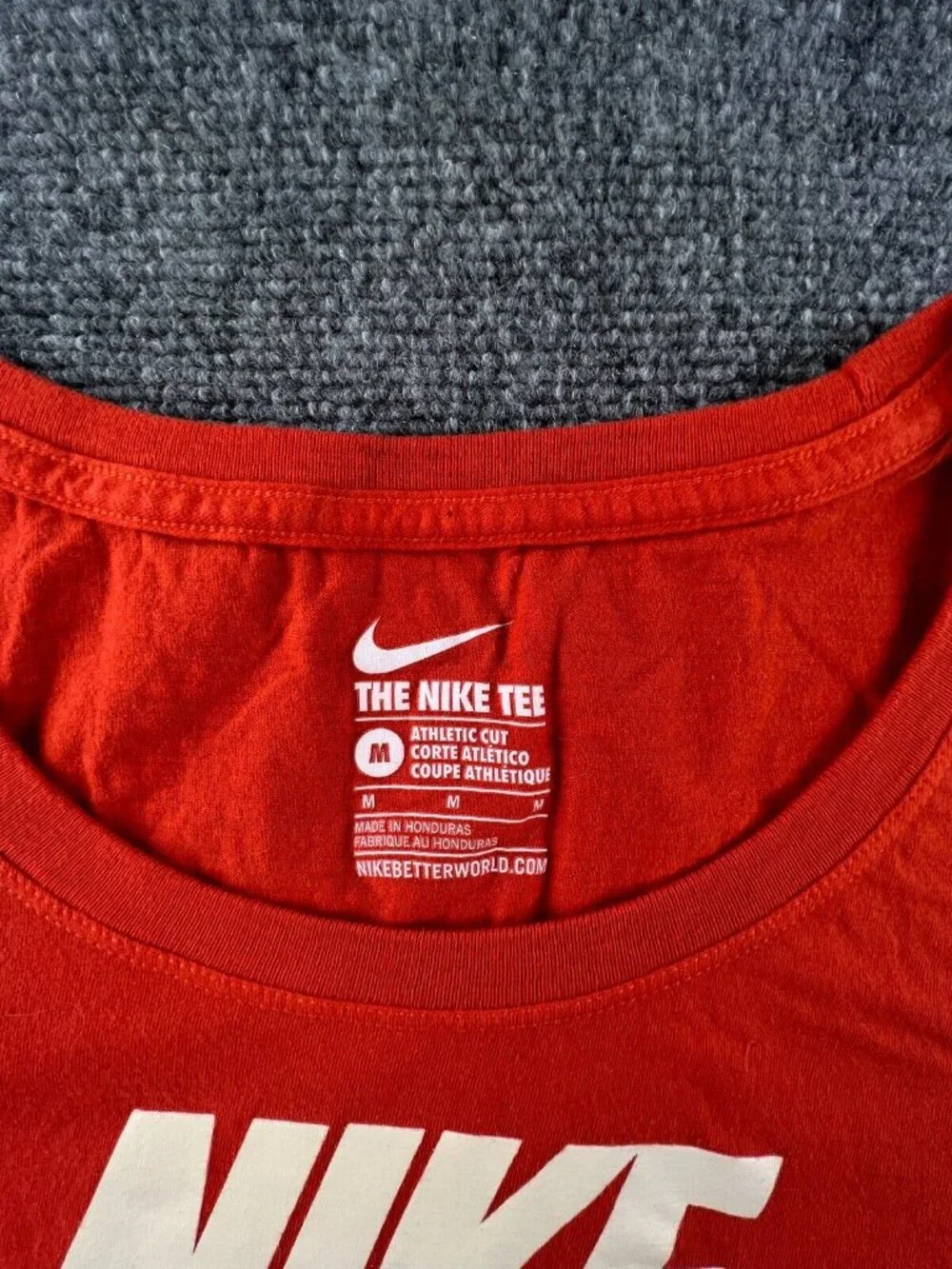 The Nike Air Tee Short Sleeve Active Shirt Size Medium Athletic Cut Orange Logo